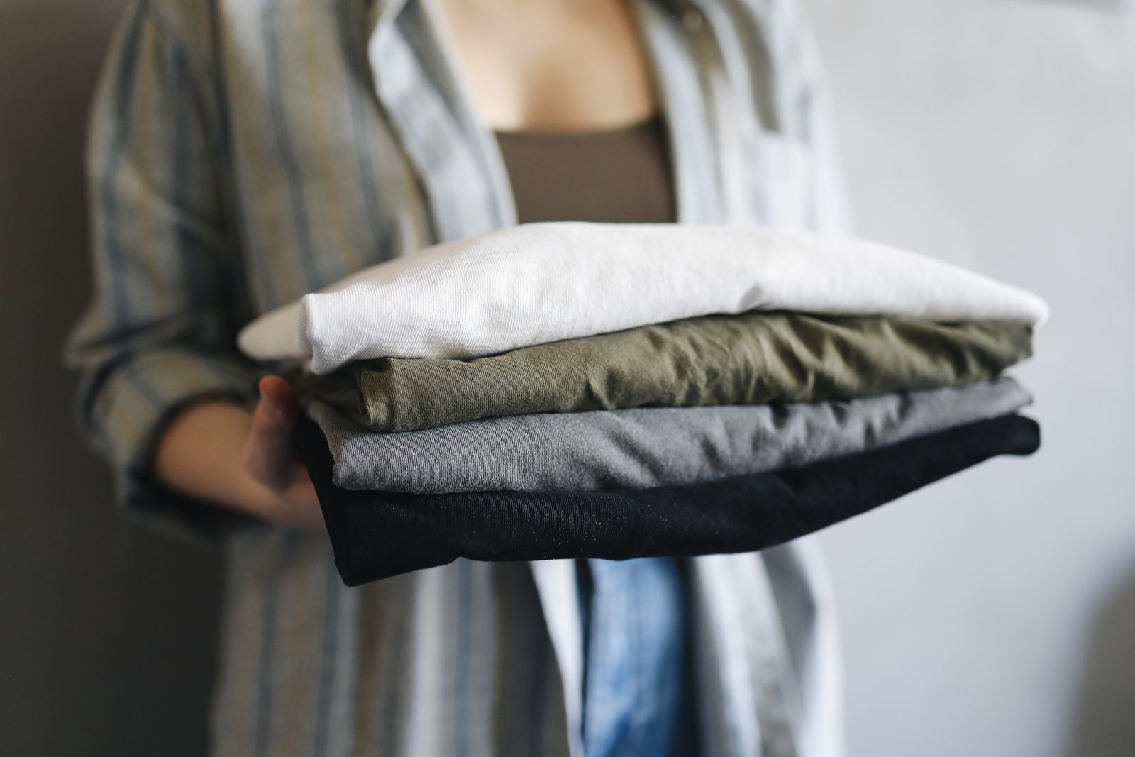 Neatly folding and sorting clothes