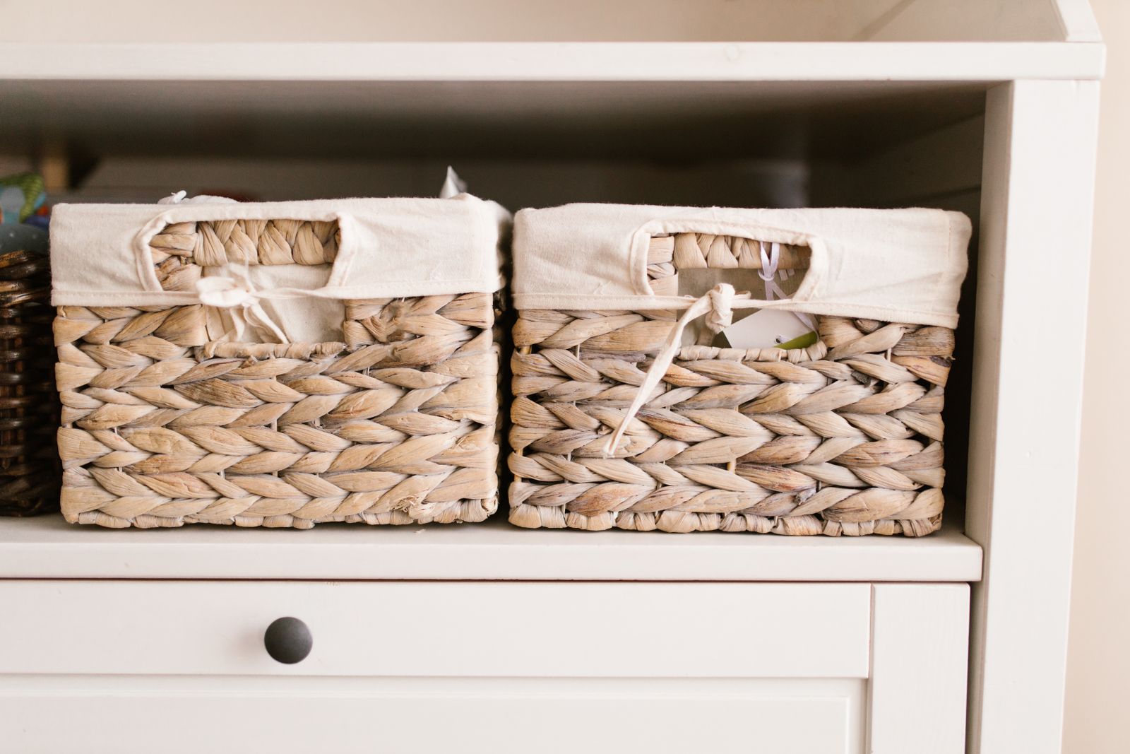 Neatly labelled storage bins and baskets